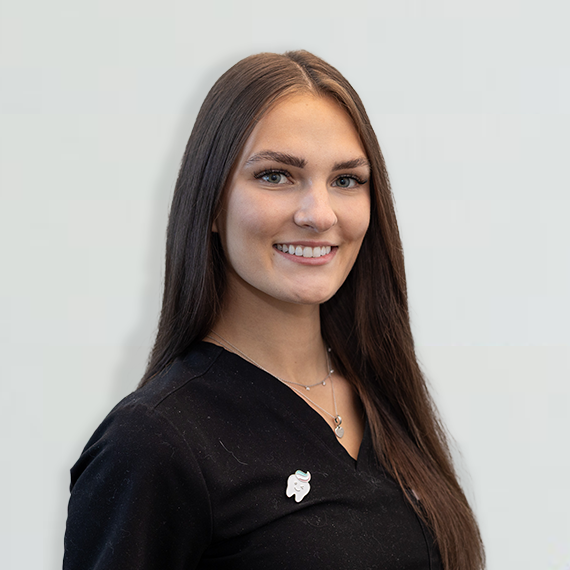 A photo of a woman smiling.