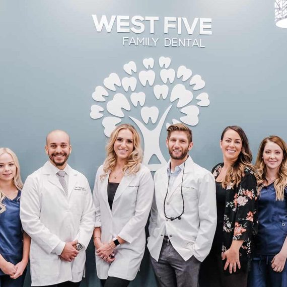 Edited-18-e1522961250137 A group of 8 dentists and office staff in the West Five office.