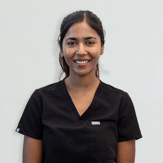 surbhi-sq A photo of a woman smiling.